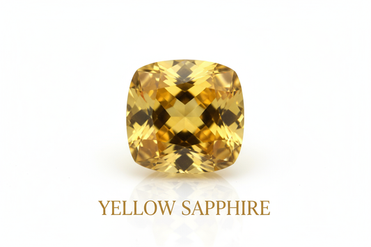 YELLOW SAPHARE STONE WITH WHITW BACKGROUND AND MENTIONE THE STONE NAME UNDER THE STONE